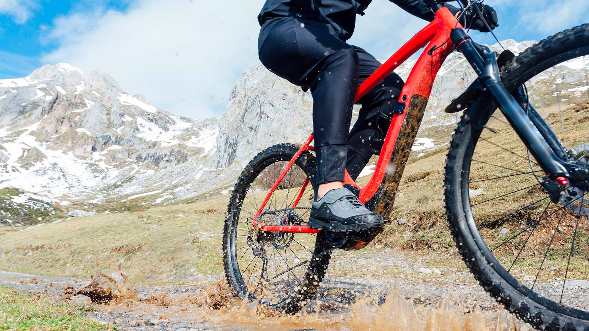 A person hiding a bicycle on the mountains